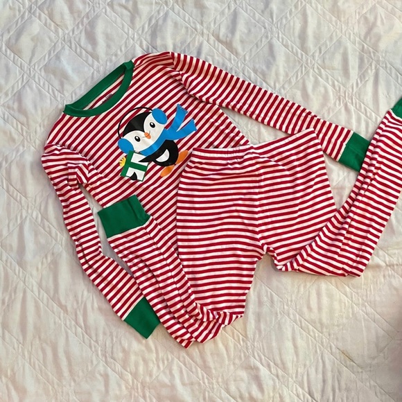Kid’s 2 piece Penguin Red & White Striped Pajamas Size 8
OFFERS WELCOME~ - Picture 2 of 3
